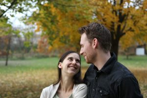 a man and woman smiling