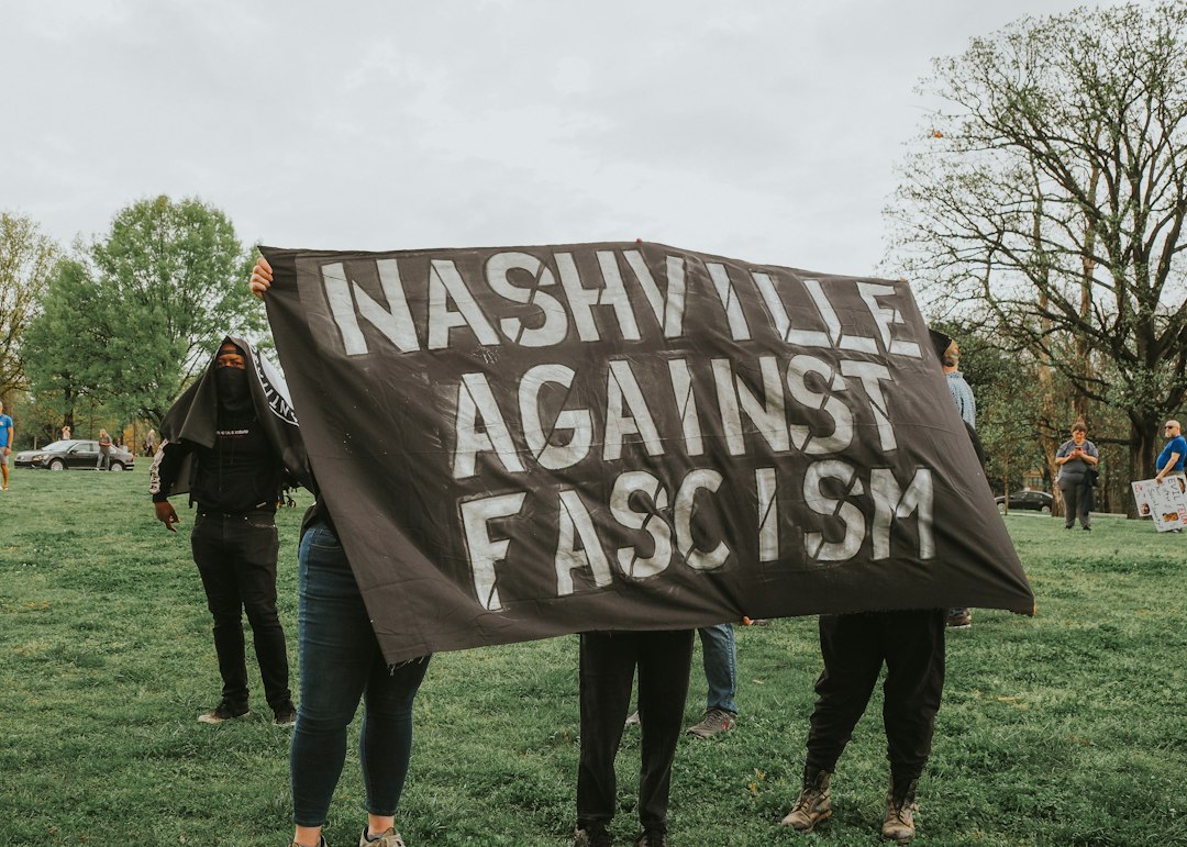 Nashville protestors hold a sign against fascism
